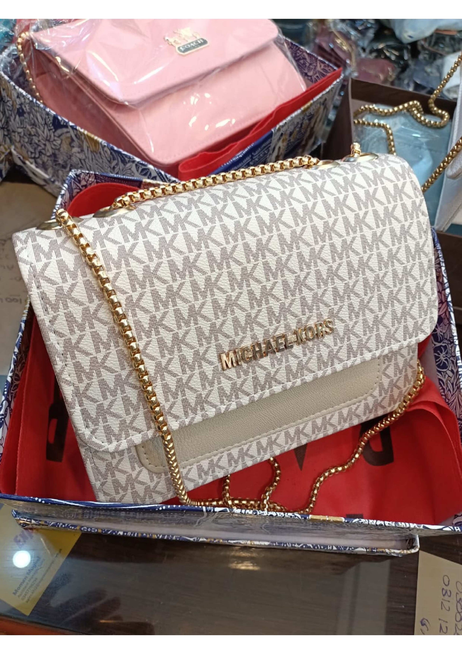MICHAEL KORS FONT MASTER  PIECE CROSS BODY BAG