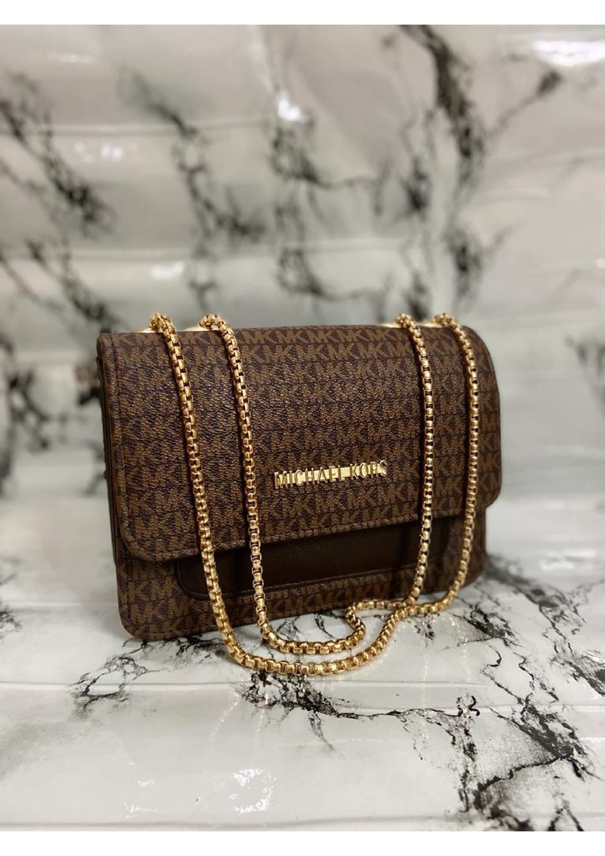 MICHAEL KORS BROWN MASTER  PIECE CROSS BODY BAG