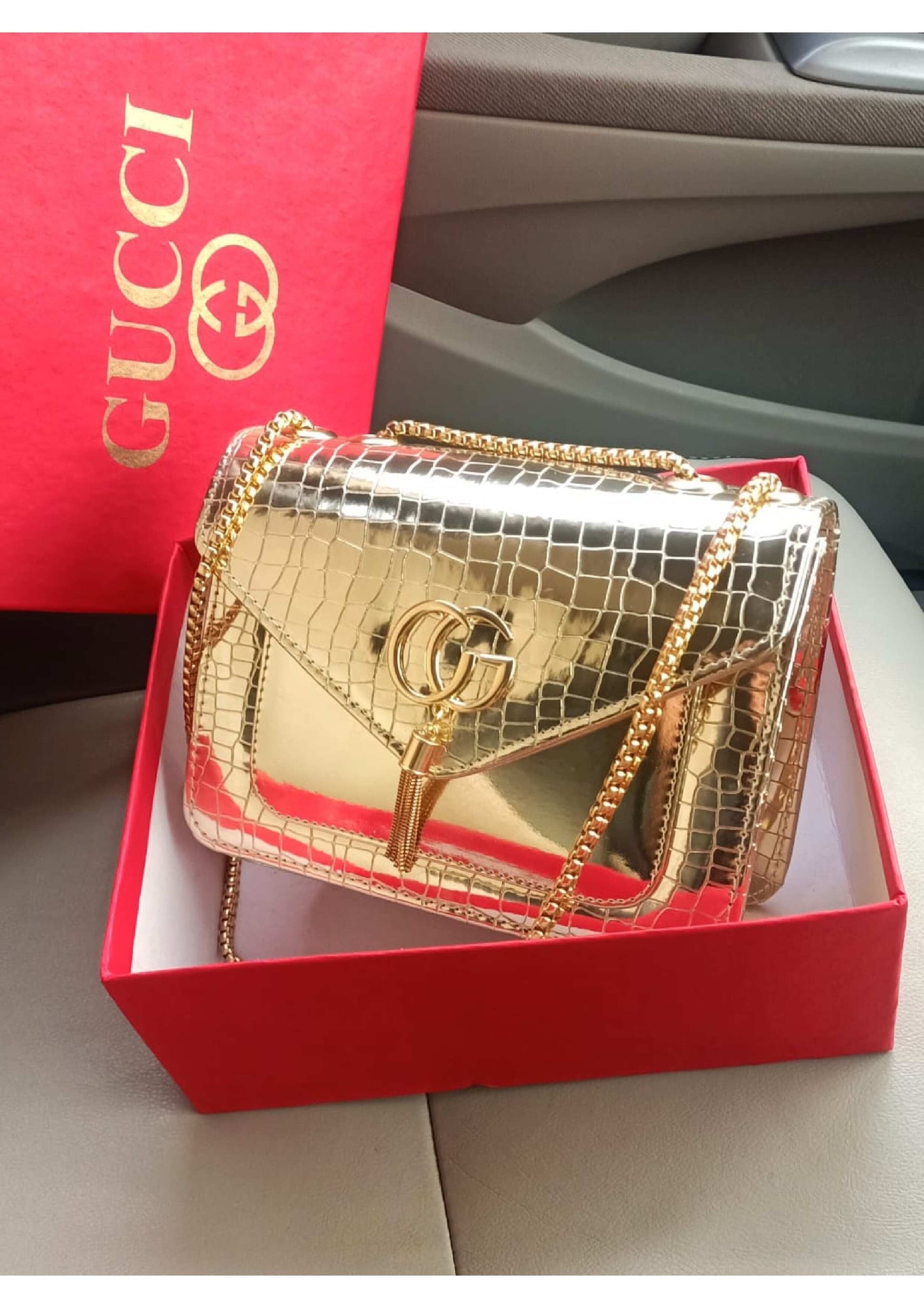 GUCCI GOLD MASTER PIECE CROSS BODY BAG